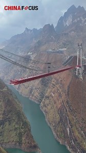 3.8M views · 5.9K reactions | The Huajiang Grand Canyon Bridge (under construction), set to be the world's highest bridge, is expected to be completed by June 2025. | China Focus | Facebook