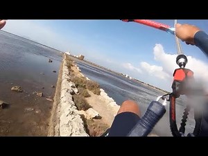 Kitesurfer Gets Taken By Wind And Crashes Into Sea Wall