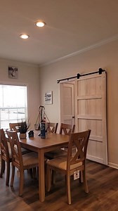 Y’ALL!! The Blue Bay farmhouse-style modular is a total DREAM!! If you’ve been looking for that perfect mix of cozy charm & modern vibes — THIS IS IT!! Check out these features: ➡️ Sliding barn doors (yes, seriously!) ➡️ HUGE walk-in closet ➡️ Spa-style walk-in shower drop-in tub to soak all your stress away ➡️ Vanity area that feels like a mini glam room ➡️ GORGEOUS glass tile backsplash ➡️ Big ol’ kitchen island for cookin’ or chattin’ ➡️ Built-in microwave (no cluttered counters here!) ➡️ Ton