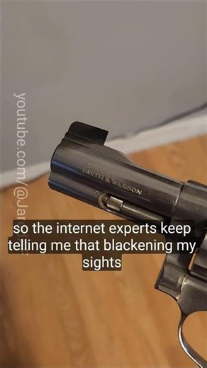 blackened sights in a holster