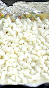 5.9K views · 32 reactions | FUNFETTI GOOEY BARS 1 box yellow cake mix ½ cup unsalted butter, softened 1 large egg ⅔ cup sprinkles ½ cup sweetened condensed milk 1 cup white chocolate chips https://www.crazyforcrust.com/funfetti-gooey-bars/ | CrazyforCrust | Facebook