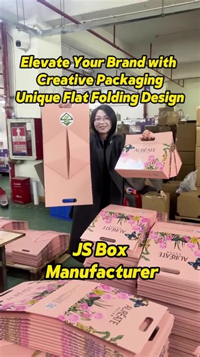 Personalized pink foldable gift box for beauty products, pink color background with colorful printing , portable handle make the box more luxury and functional. #giftbox #packagingdesign #packagingsupplies #packagingsolutions #packagingideas #foldablebox #foldingbox #flatpack #beautyproducts #cosmetics #skincare #europe #france #jsbox