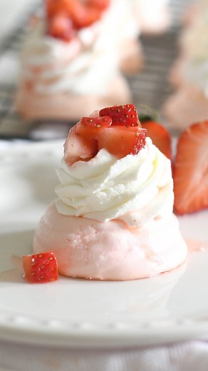36K views · 2K reactions | ✨ Mini Strawberry Pavlovas ✨I’ve posted this recipe before but these picture-perfect crispy meringues topped with velvety whipped cream and juicy fresh strawberries are always a great idea❤️ Have a great weekend and happy baking Full recipe linked in bio and comments  Or Google Search “Manuela strawberry pavlova “ and the recipe will pop up!  | Cooking with Manuela | Facebook