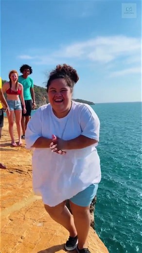 She jumped off the cliff and didn't expect THIS 😱 #courage #adventure #heartwarming