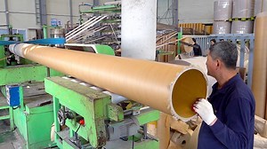 Crafting Paper Tubes with Heavy Machines and Hardworking Hands