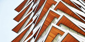 Metal Profiles Coated with Wood Veneers: 7 Options for Applying them to Architecture