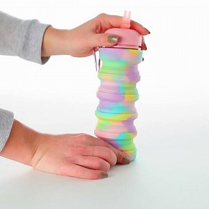 5.7K views · 32 reactions | can you find a cooler water bottle!??  push it down and throw it in your bag! takes up no room! get it in 2 funky colours! #Smiggle #smile #giggle | Smiggle | Facebook