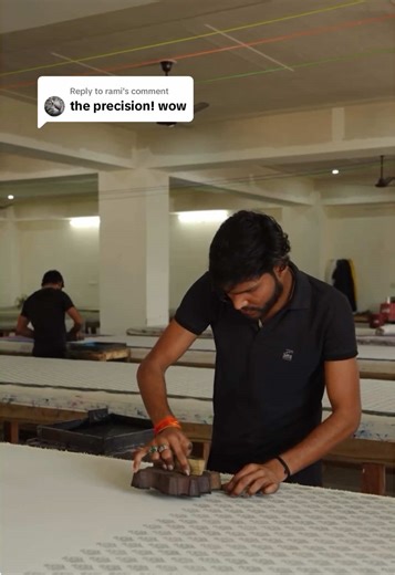 Replying to @rami Block printing is one of the oldest forms of textile art and every step is done entirely by hand. The wooden blocks are first carved by artisans who work with millimetre‑level precision to bring each motif to life. Once the dyes are mixed, the printer aligns the block by eye and stamps the fabric one impression at a time, building the pattern slowly and flawlessly. It’s an intricate dance of patience and generational skill. Watching it up close, you realise how much intention s