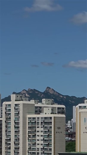 'Bukhansan', embracing northern Seoul. The most visited mt. in the world, the Guinness World Record.