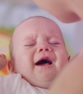 Baby Crying While Breastfeeding: 20 Causes & Soothing Tips