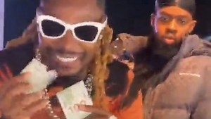 Birmingham: Singer Asake gives out 100 dollar bills