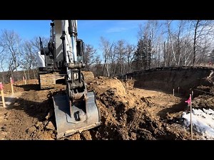 Digging a large hole with a small excavator!!