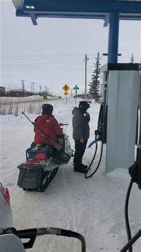 Hunting on the skidoo Subsistence living. Rural Alaska. Ptarmigan, fox, porcupine, rabbit...pop cans