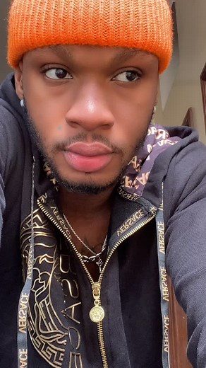 Versace Hoodie Fashion Statement in Indoor Setting