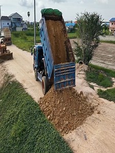 696K views · 4K reactions | Impressive Land Development! Businessman Covers Grass with Soil, Attracting Photographers #bulldozer #construction #excavator #heavyequipment #fblifestyle | Excavator Bulldozer | Facebook