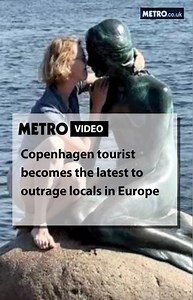This tourist angered locals by getting way too friendly with Copenhagen’s Little Mermaid statue, despite it being surrounded by signs banning climbing. But, they aren’t the first to act outrageously in Europe this summer. Let’s take a look back. | Metro
