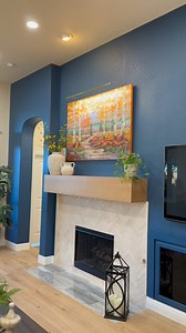 It’s the bold details that make a house feel like home. This stunning accent wall painted in @sherwinwilliams 9150 ‘Endless Sea’ transforms the space into a cozy retreat, perfectly complementing the updated fireplace. Ready to elevate your living room? Let’s make it happen together! #DFWImproved #FireplaceRemodel #AccentWall | DFW Improved | Facebook