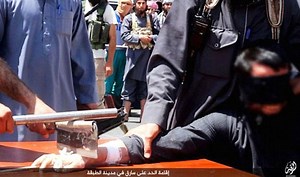 ISIS thugs chop off thief’s HAND with a CLEAVER, pictures show