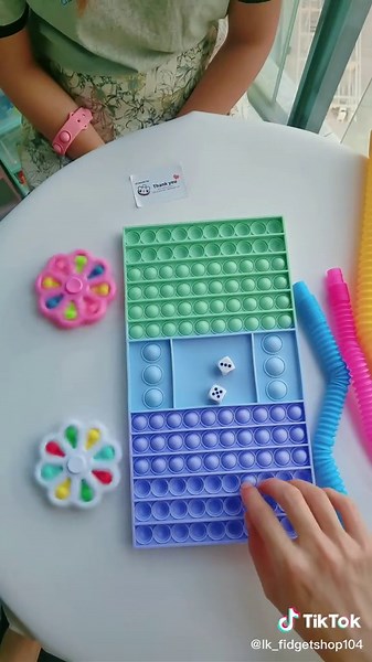 Playing Board Game With Pop It