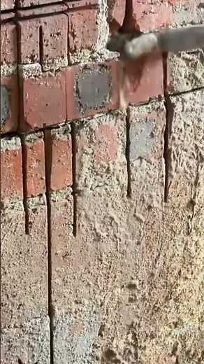 A tutorial on dismantling a brick wall in a building #viral #constructionchannel #woodscraft
