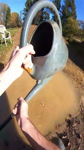 How to drain water from a hole using a hose!