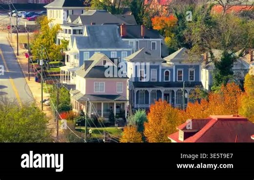 Historic American architecture of Macon, old historical city in Georgia. Colorful fall season trees surrounding large Victorian homes in USA Southern cityscape Stock Video Footage - Alamy