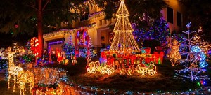 How to Hang Christmas Lights Outside Your House | DoItYourself.com