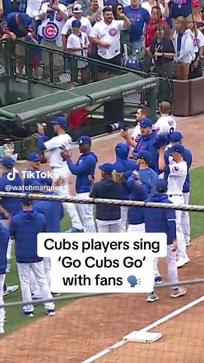 Cubs Players Sing 'Go Cubs Go' with Fans