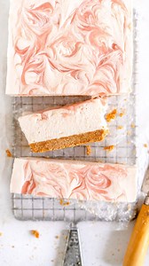 This small batch cheesecake recipe works with a ton of different fruit but rhubarb is my very fave. You make an easy puree which goes into the filling and is also swirled on top. Full recipe is in my profile! #cheesecake #rhubarbrecipes | Cloudy Kitchen