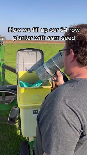 Corn Plantation: Filling Up a 24 Row Planter with Seed