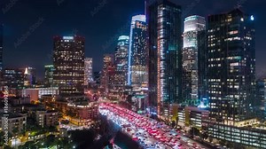 Cinematic urban aerial time lapse of downtown Los Angeles at night.
