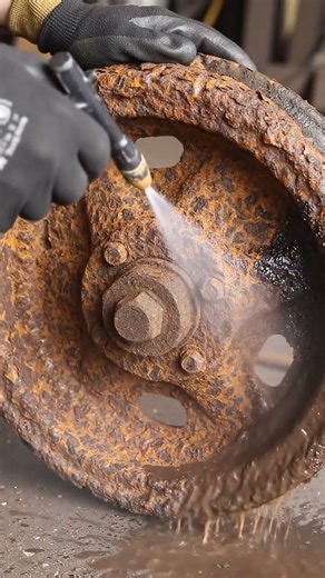 rust removal on trolley wheel