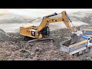 Caterpillar 390F Excavator Loading Mercedes Arocs Trucks