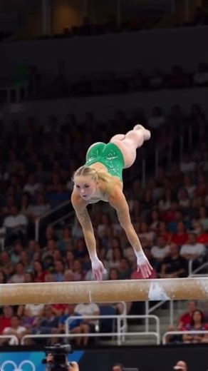 A girl performing on the balance beam #AIGymnastics #OlympicGymnastics