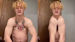 Man born without collar bones claps his shoulders.