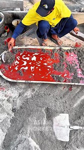 Amazing Red Cement Wall Decoration by Skilled Hands | Asian Workers
