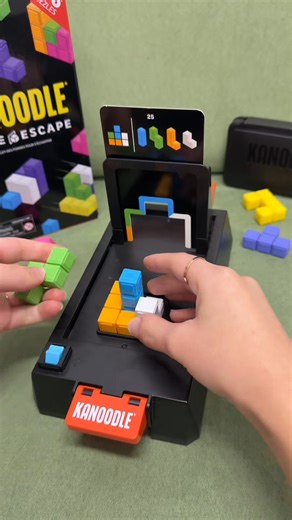 1.8K views · 15 reactions | Can you beat the clock? ⏱️ Race against the moving timer wall in NEW Kanoodle Shape Escape! ⚡ Pick a challenge card and build the shape that will pass through the hole in the wall—before the wall reaches you and knocks it over! 里 Test your skills with 106 puzzles!  Shop today: https://edin.com/by2 | Educational Insights | Facebook