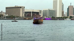 Dubai creek, the old and historic side of Dubai city - Old Arabian buildings and boats - Al Seef District, outdoor shopping and restaurants