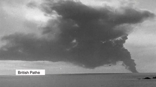 Torrey Canyon tanker being bombed during oil spill