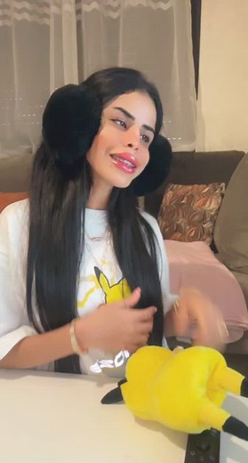 Engaging With a Pikachu Plush Toy in a Fun Video