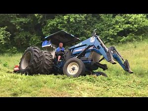 Extreme bush hogging steep ground on a rear wheel drive tractor