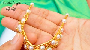 151 reactions · 27 shares | Elegant Pearl Necklace | Beginner-Friendly Beaded Jewelry Tutorial  **Watch Now on YouTube** **Creative Crafts By Fozi**   https://youtu.be/-5Mw-8ytF0s #pearls #pearlnecklaces #beadedjewelery #jewelrymaking #handmadejewelry #diyjewelry @highlight | Fouzia Shahid | Facebook