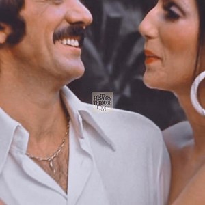 "Circa the early 1970s, Sonny Bono and Cher were photographed during the production of The Sonny and Cher Comedy Hour, a variety show that became a cultural touchstone of American television. Premiering in August 1971 on CBS, the program quickly captured audiences with its blend of musical performances, comedic sketches, and the couple’s playful onstage banter. Cher’s dazzling Bob Mackie gowns became iconic, while Sonny’s comedic timing provided balance to her sharp wit. At its height, the show 