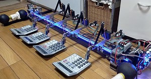 'A-HOGE' is a calculator-playing robot that performs mozart with precision
