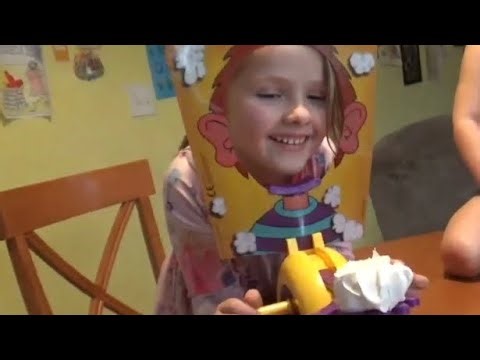 Playing pie face game with kids