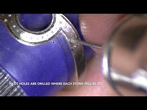 Diamond grain setting a platinum shaped band