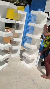 5.5K views · 2K reactions | This column wall shelf showcases a sleek modern design and is a great space-saving solution for smaller areas. It displays five tiers of shelving perfect for ,decorating items, books, photos, CDs, or collectibles . With a contemporary and neutral black grain finish, it makes an ideal accent for any color scheme. This design attaches to the wall with two screws and anchors. | BACH Furniture | Facebook