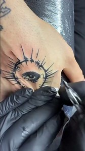 Black hand tattoo