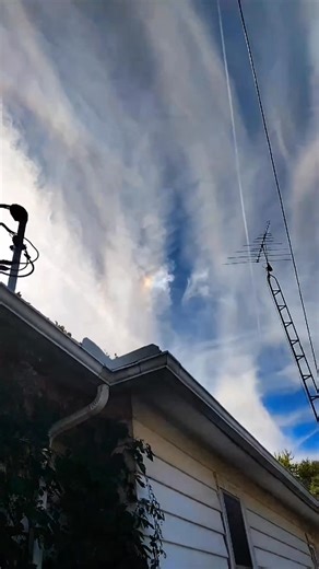 Rainbow cloud ... Sun halo.. Art in the sky.. Look close what do u c.. 👀☀💜🤔 | Amanda Holt