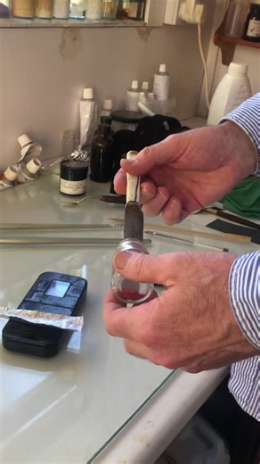 Grinding a deep red madder lake pigment for cello varnish with a glass muller. #cellomaker #cello #violoncello | Aitchison & Mnatzaganian Cello Specialists